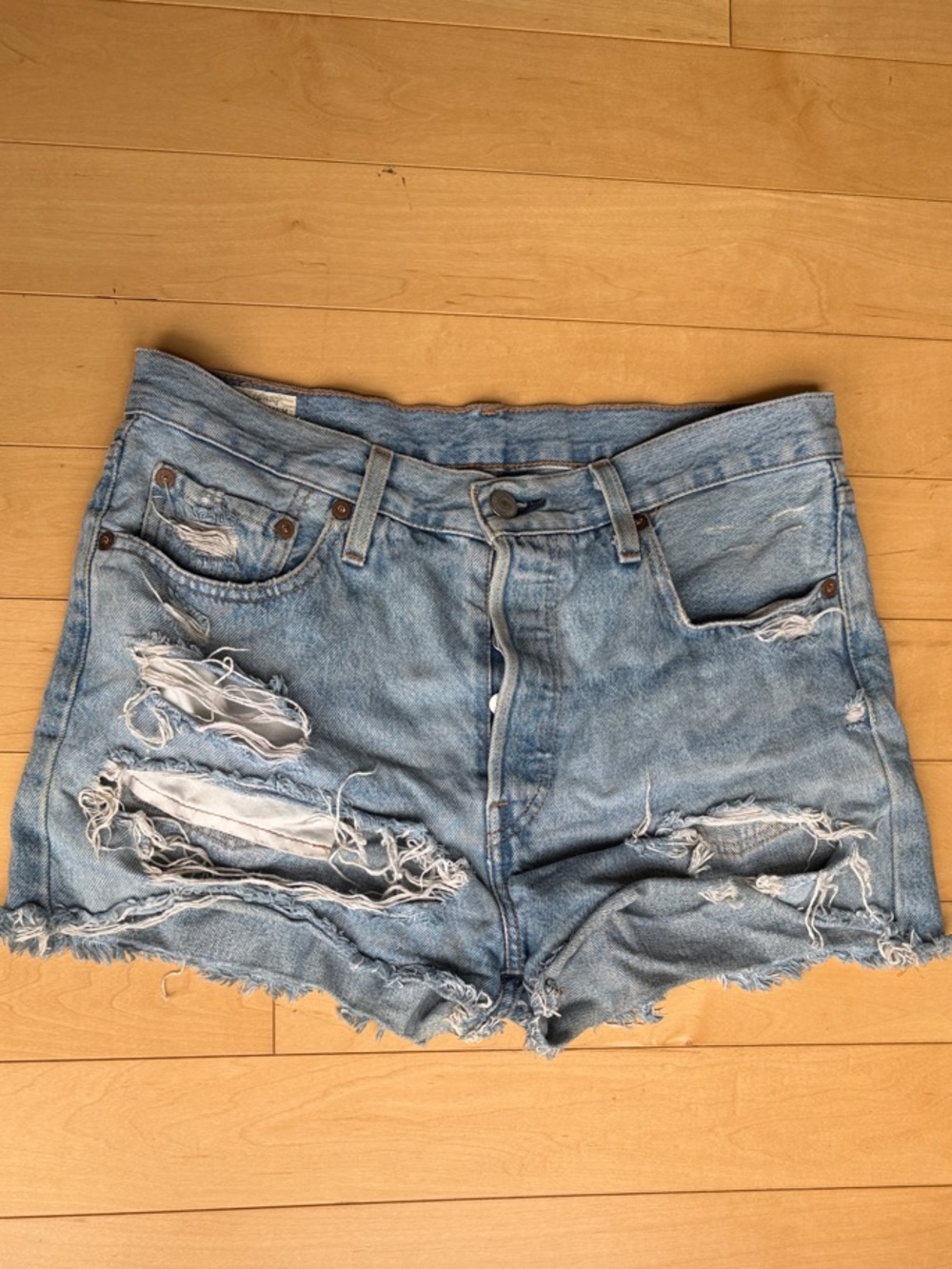 Vintage Levi's Light Wash Ripped Denim Cutoff Shorts